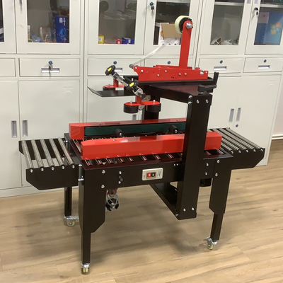 Electric Driven Semi Automatic Case Carton Box Taping Sealer with Sole Universal Wheel