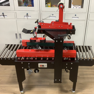 Electric Driven Semi Automatic Case Carton Box Taping Sealer with Sole Universal Wheel