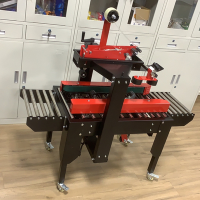 Electric Driven Semi Automatic Case Carton Box Taping Sealer with Sole Universal Wheel